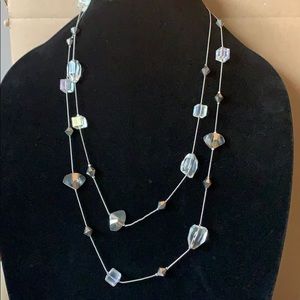 Long necklace with clear and gray embellishments